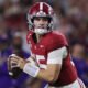 Alabama Quarterback Ty Simpson (15) in action against LSU